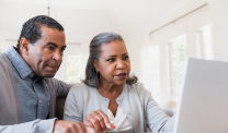 Couple watching webinar