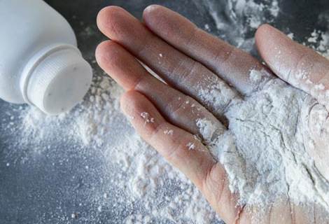 Talcum powder on hands